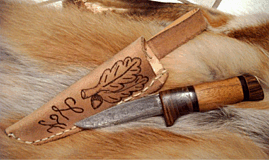 Messer aus Damaszener Stahl mit Lederkcher